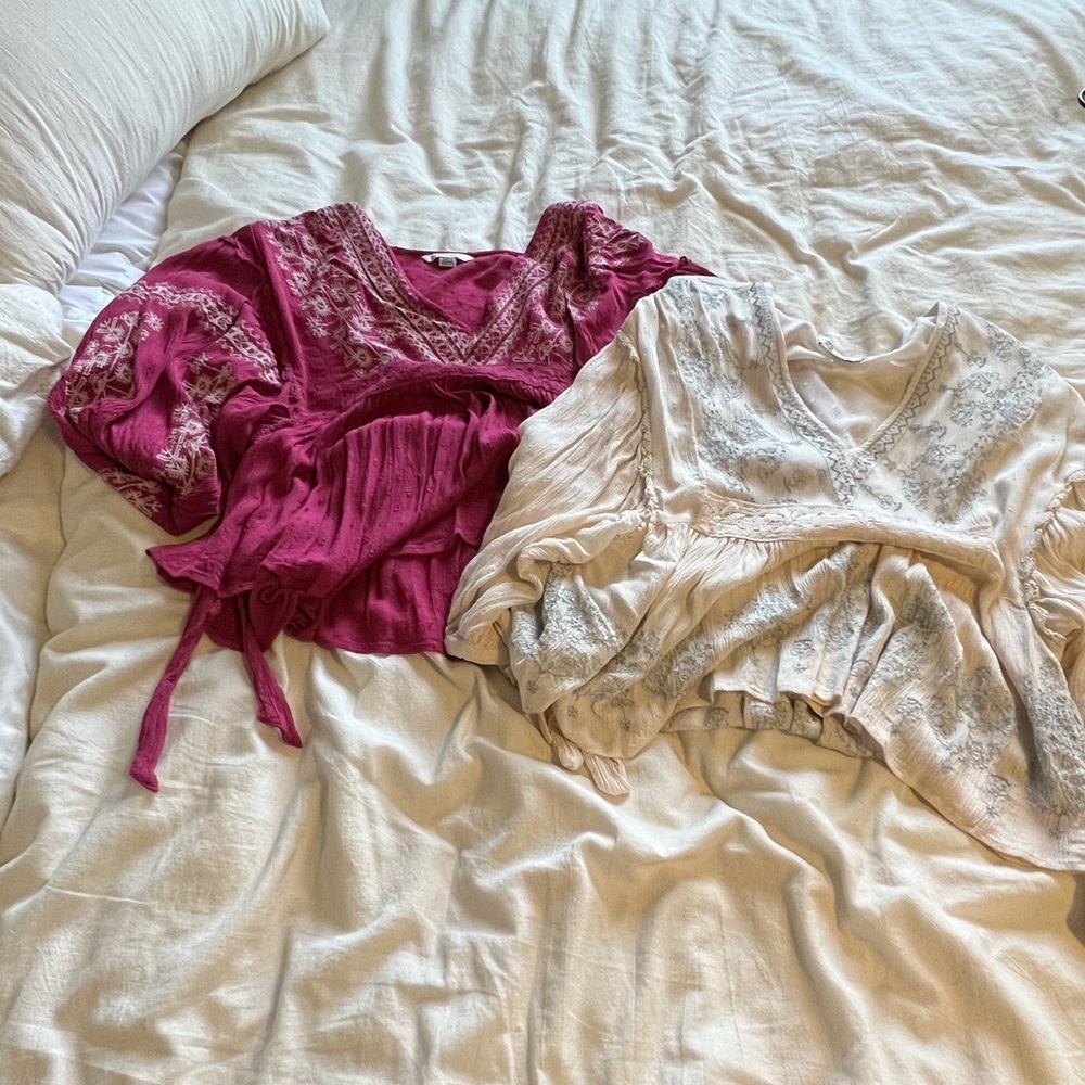 White and pink American eagle tops.